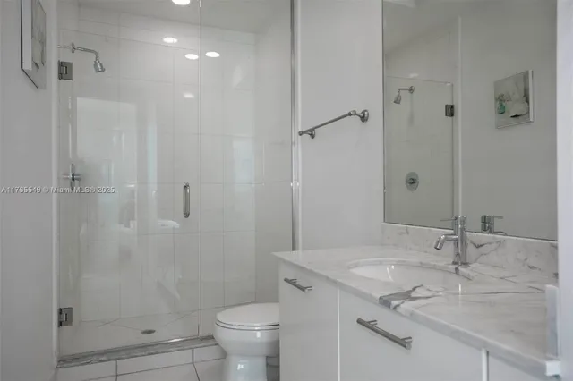 a view of a balcony with wooden floor