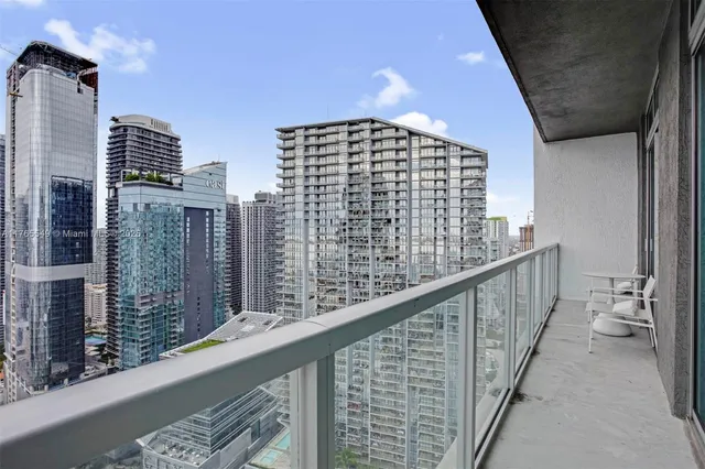 a view of a lake with a building in the background