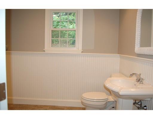 5 Westgate Road Framingham, MA 01701 - Photo 11 of 14 a bathroom with a toilet a sink and a window