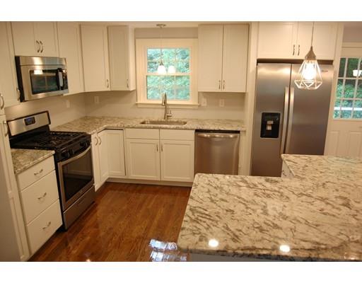 5 Westgate Road Framingham, MA 01701 - Photo 3 of 14 a kitchen with granite countertop a refrigerator stove top oven and sink