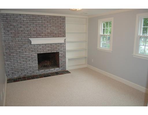 5 Westgate Road Framingham, MA 01701 - Photo 10 of 14 a view of an empty room with a fireplace