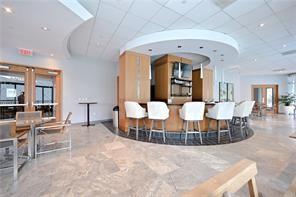 3338 Peachtree Road Northeast, Unit 1905 Atlanta, GA 30326 - Photo 24 of 25 a view of a living room and dining room