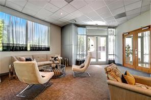 3338 Peachtree Road Northeast, Unit 1905 Atlanta, GA 30326 - Photo 25 of 25 a living room with furniture and large windows
