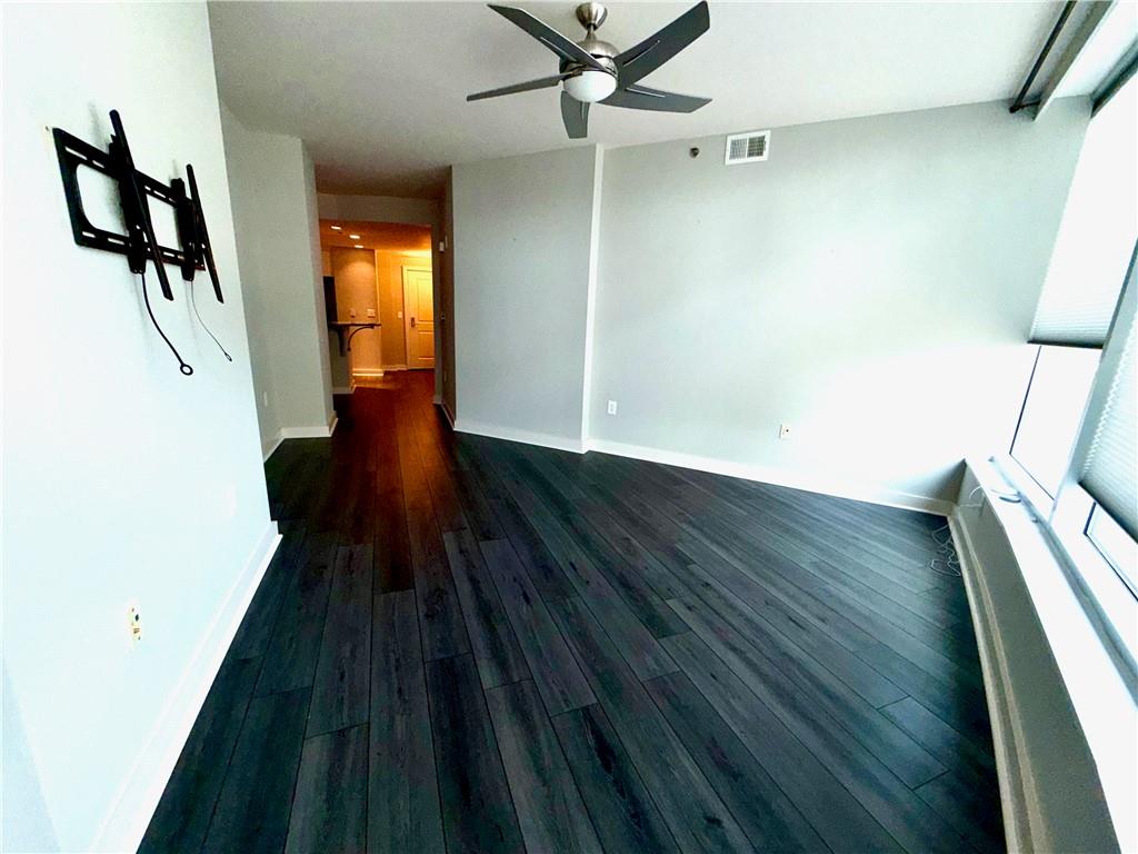 3338 Peachtree Road Northeast, Unit 1905 Atlanta, GA 30326 - Photo 4 of 25 wooden floor in a gallery