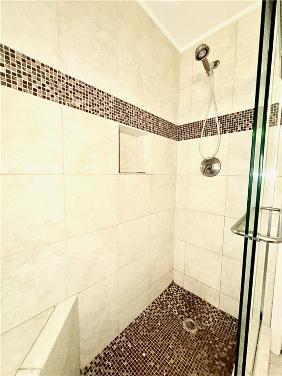 3338 Peachtree Road Northeast, Unit 1905 Atlanta, GA 30326 - Photo 7 of 25 a bathroom with a shower