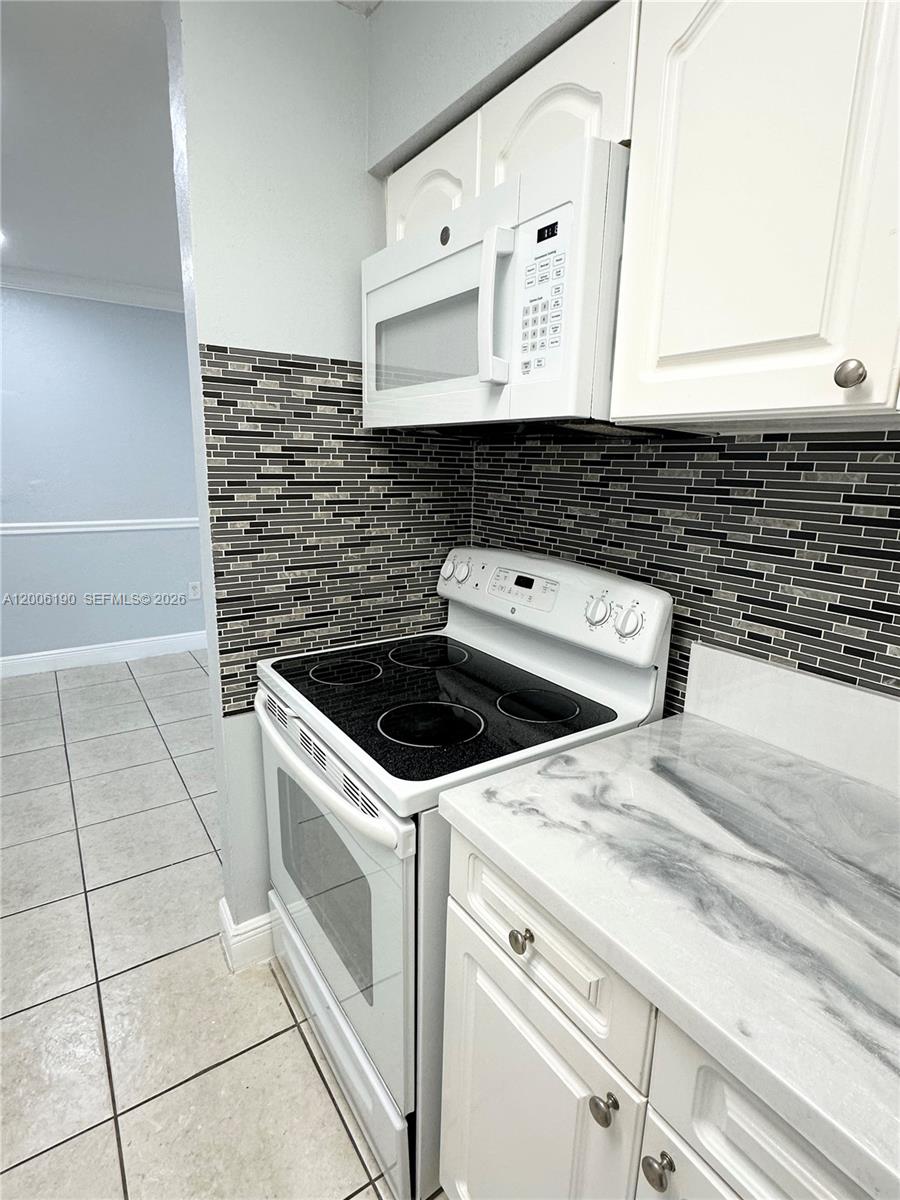 9403-9405 Southwest 76th Street, Unit Y32 Miami, FL 33173 - Photo 2 of 13