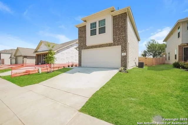 a front view of house with yard