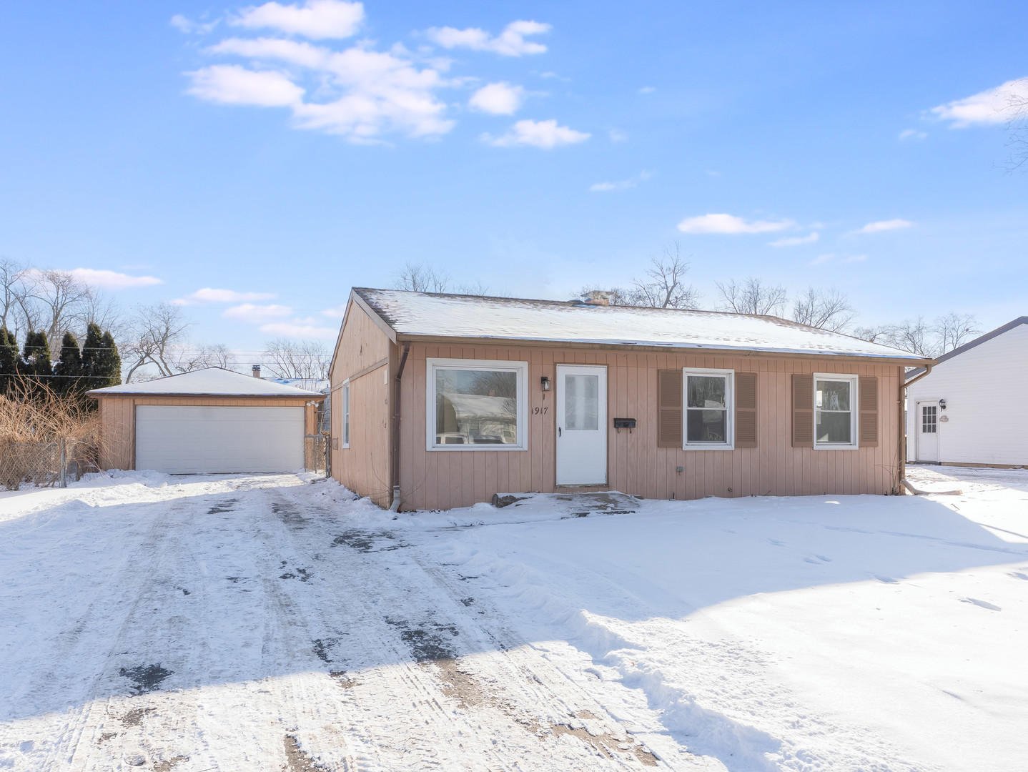 1917 Linden Avenue Hanover Park, IL 60133 - Photo 2 of 22 a view of a house with a patio