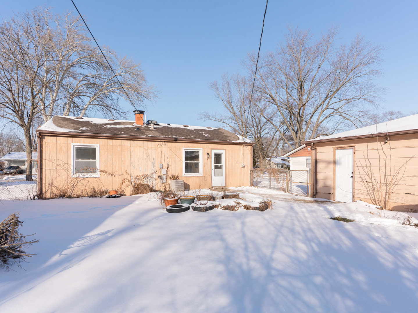 1917 Linden Avenue Hanover Park, IL 60133 - Photo 4 of 22 a view of a house with backyard and sitting area