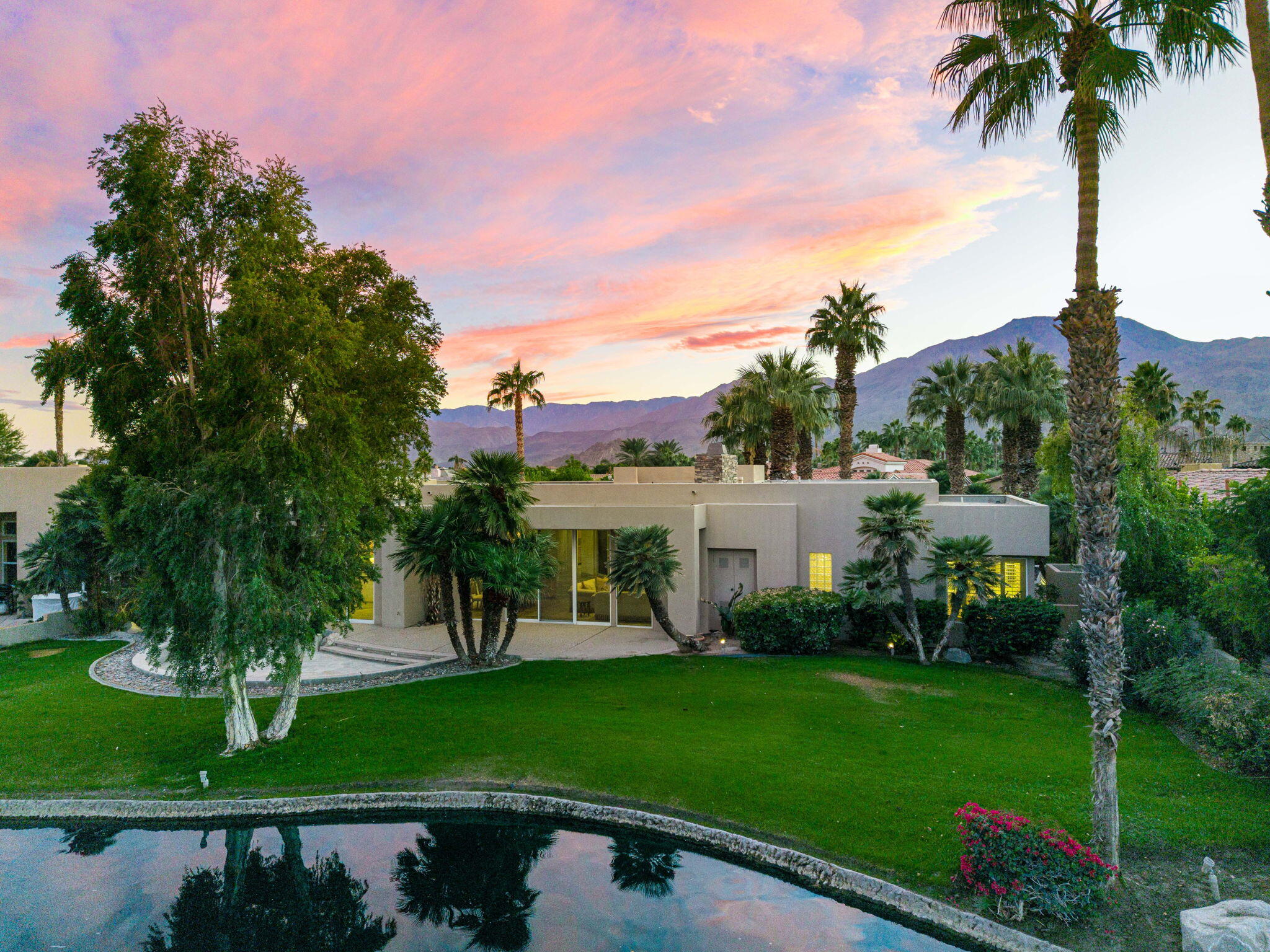55770 Cherry Hills Drive La Quinta, CA 92253 - Photo 13 of 43 a view of a house with a yard