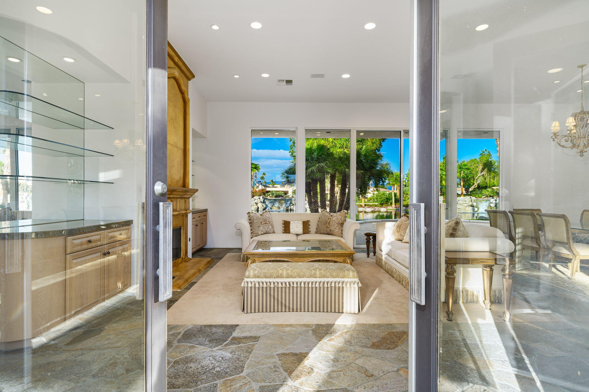 55770 Cherry Hills Drive La Quinta, CA 92253 - Photo 17 of 43 a lobby with furniture and floor to ceiling window