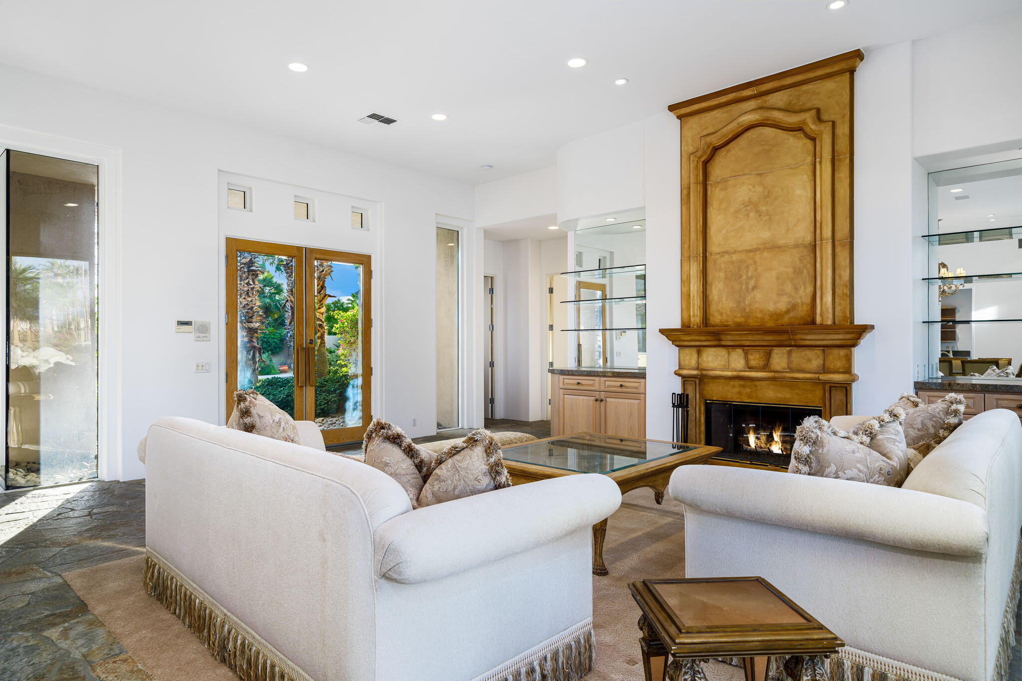55770 Cherry Hills Drive La Quinta, CA 92253 - Photo 20 of 43 a living room with furniture and a fireplace