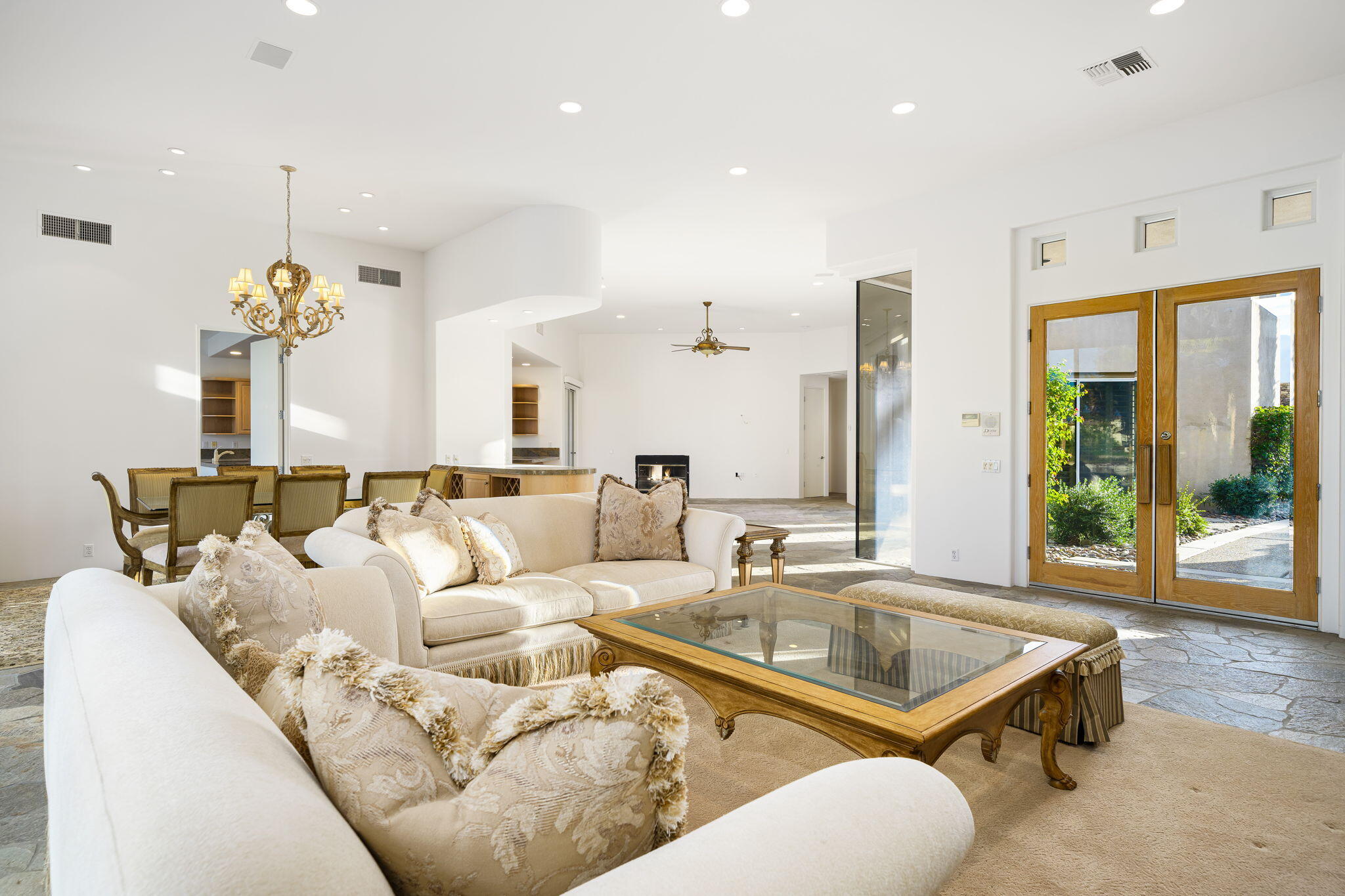 55770 Cherry Hills Drive La Quinta, CA 92253 - Photo 21 of 43 a living room with furniture and a table