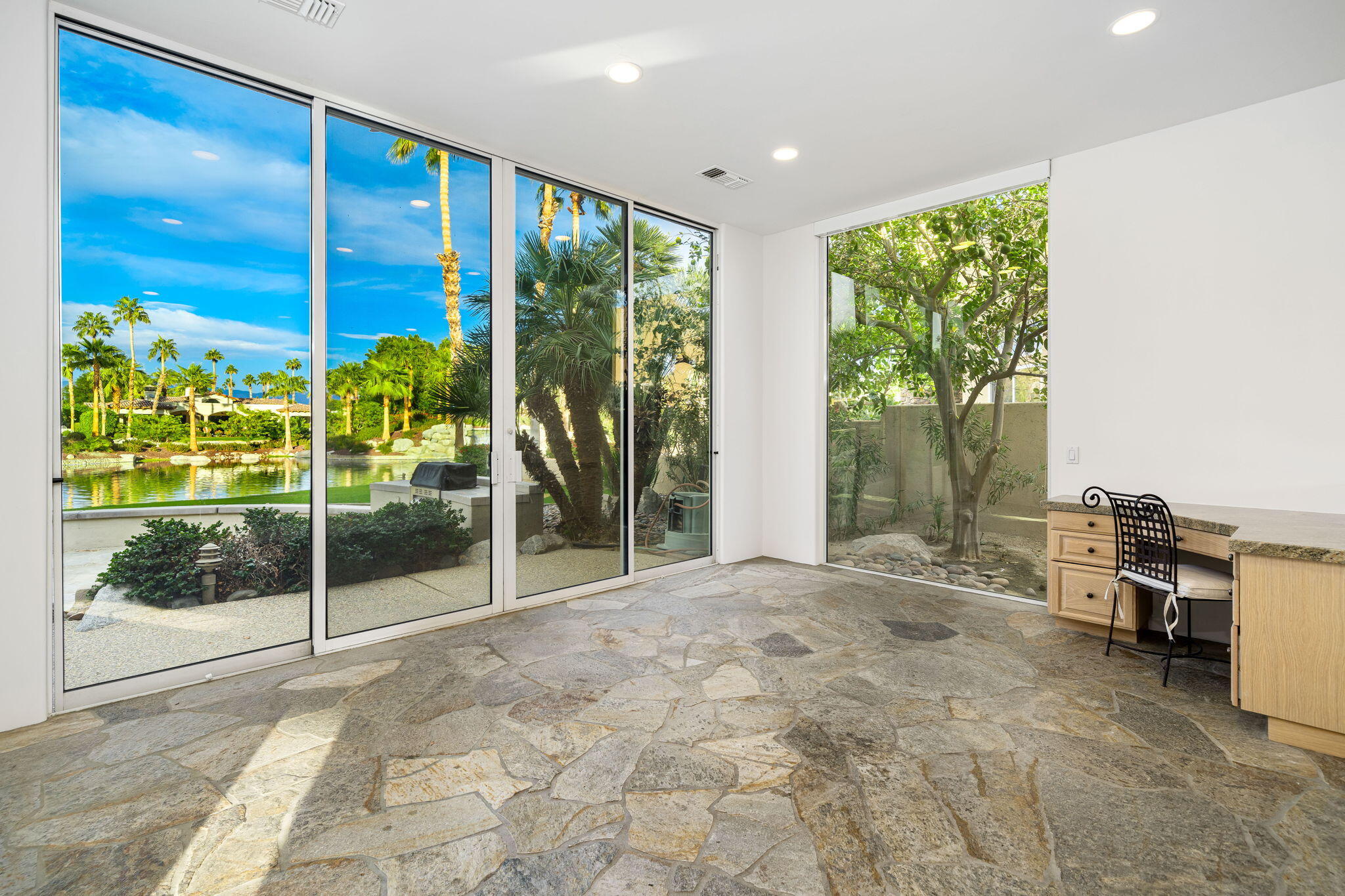 55770 Cherry Hills Drive La Quinta, CA 92253 - Photo 29 of 43 a view of front door and porch