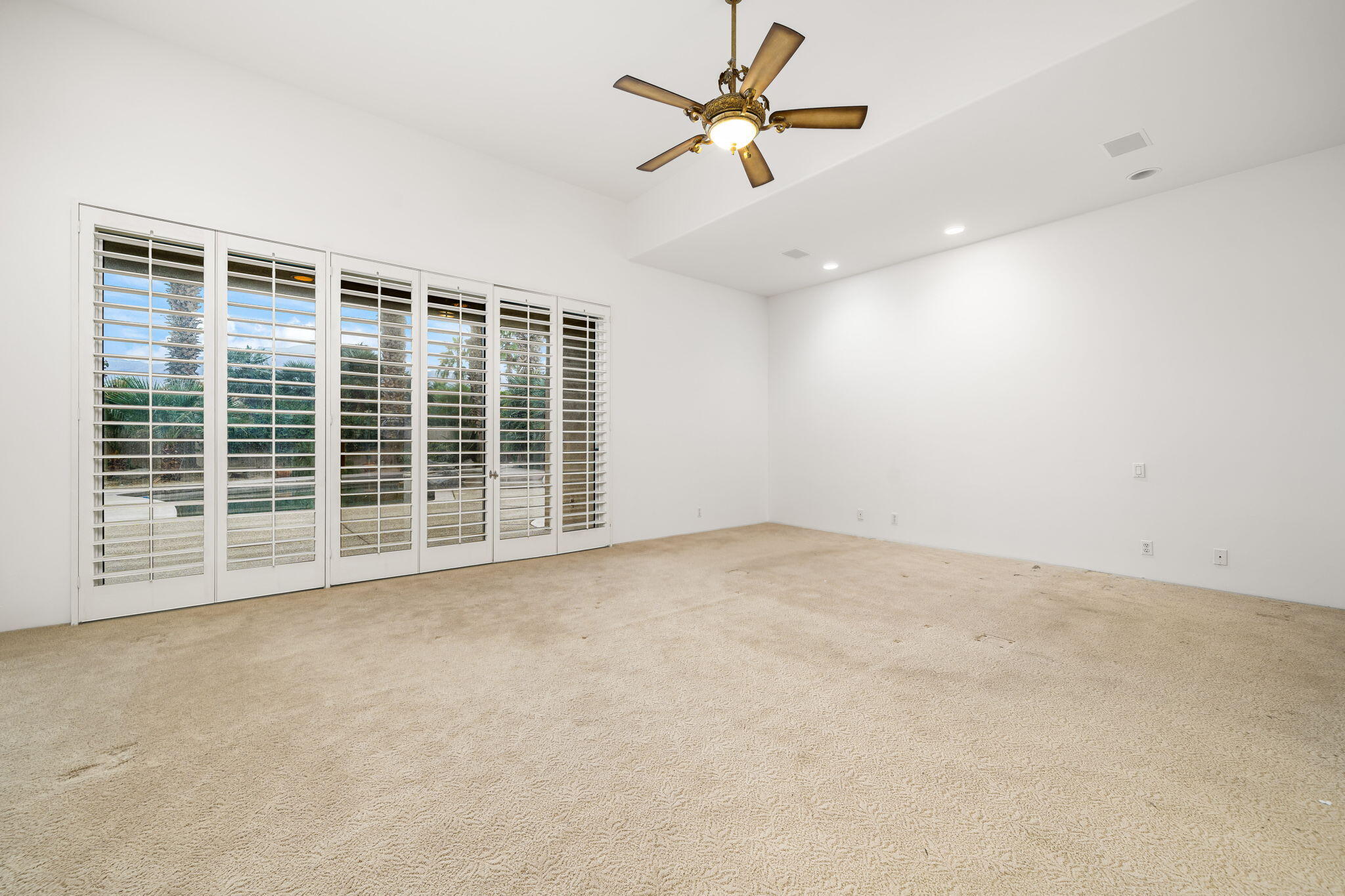 55770 Cherry Hills Drive La Quinta, CA 92253 - Photo 31 of 43 a view of an empty room with a window