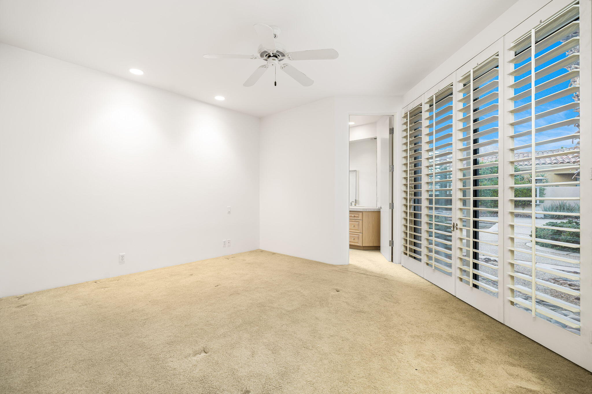 55770 Cherry Hills Drive La Quinta, CA 92253 - Photo 36 of 43 a view of an empty room with a window