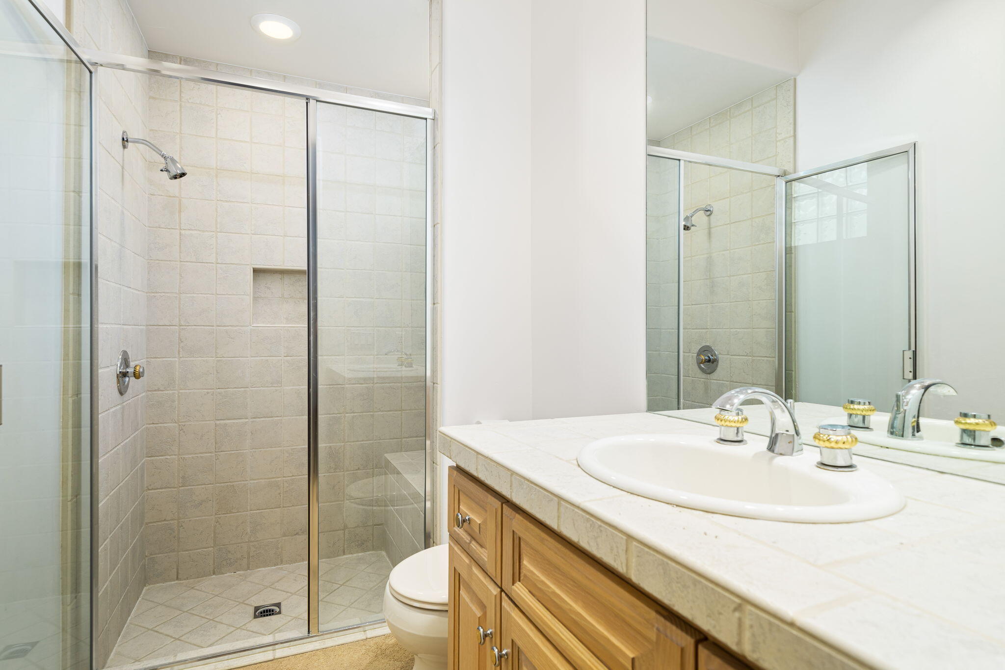 55770 Cherry Hills Drive La Quinta, CA 92253 - Photo 39 of 43 a bathroom with a sink and a mirror