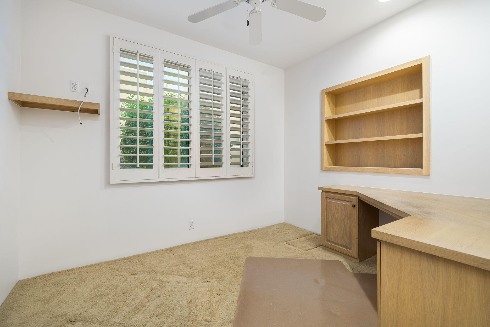 55770 Cherry Hills Drive La Quinta, CA 92253 - Photo 42 of 43 a bedroom with a bed and a window