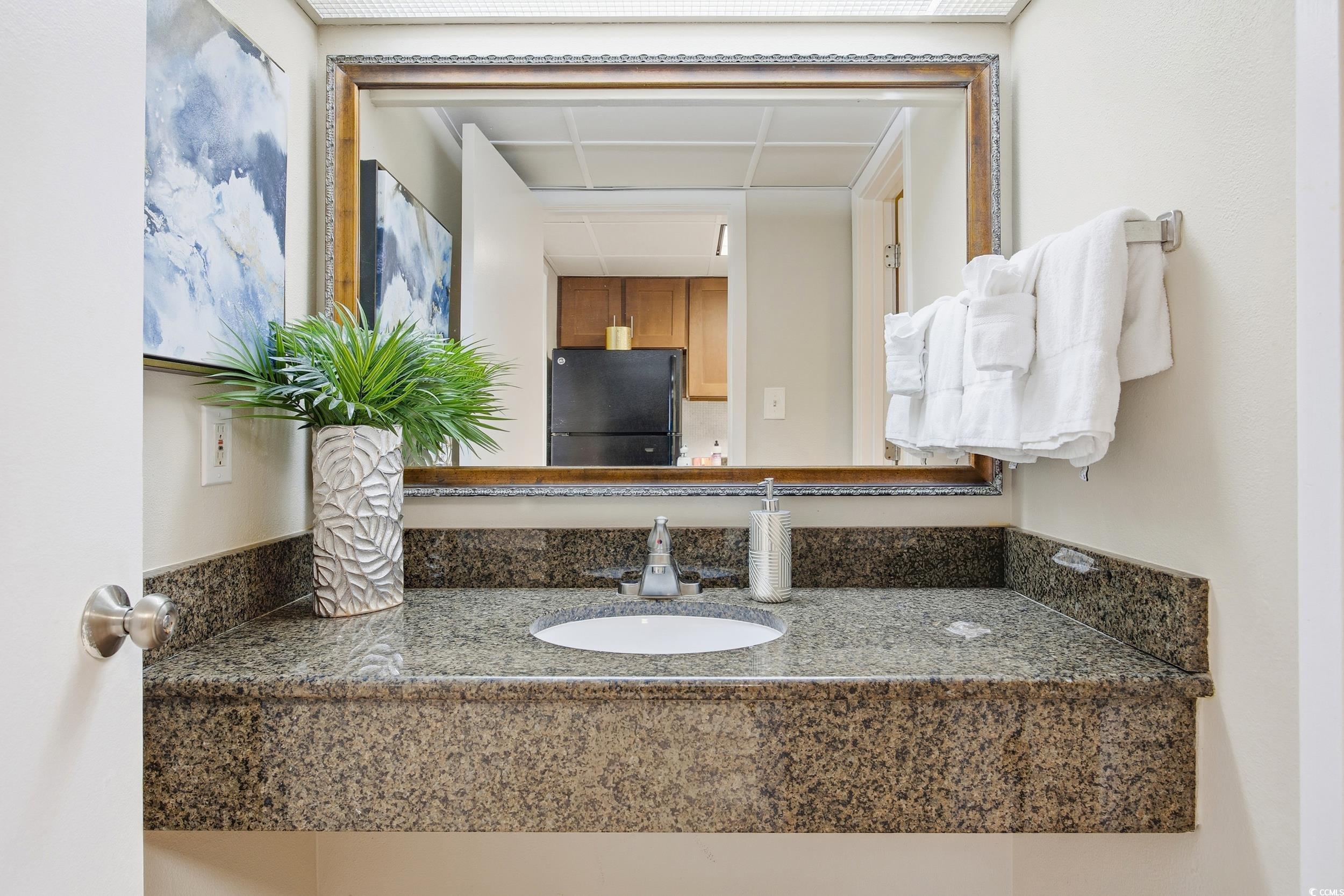 1105 South Ocean Boulevard, Unit 932 Myrtle Beach, SC 29577 - Photo 16 of 32 Bathroom featuring vanity