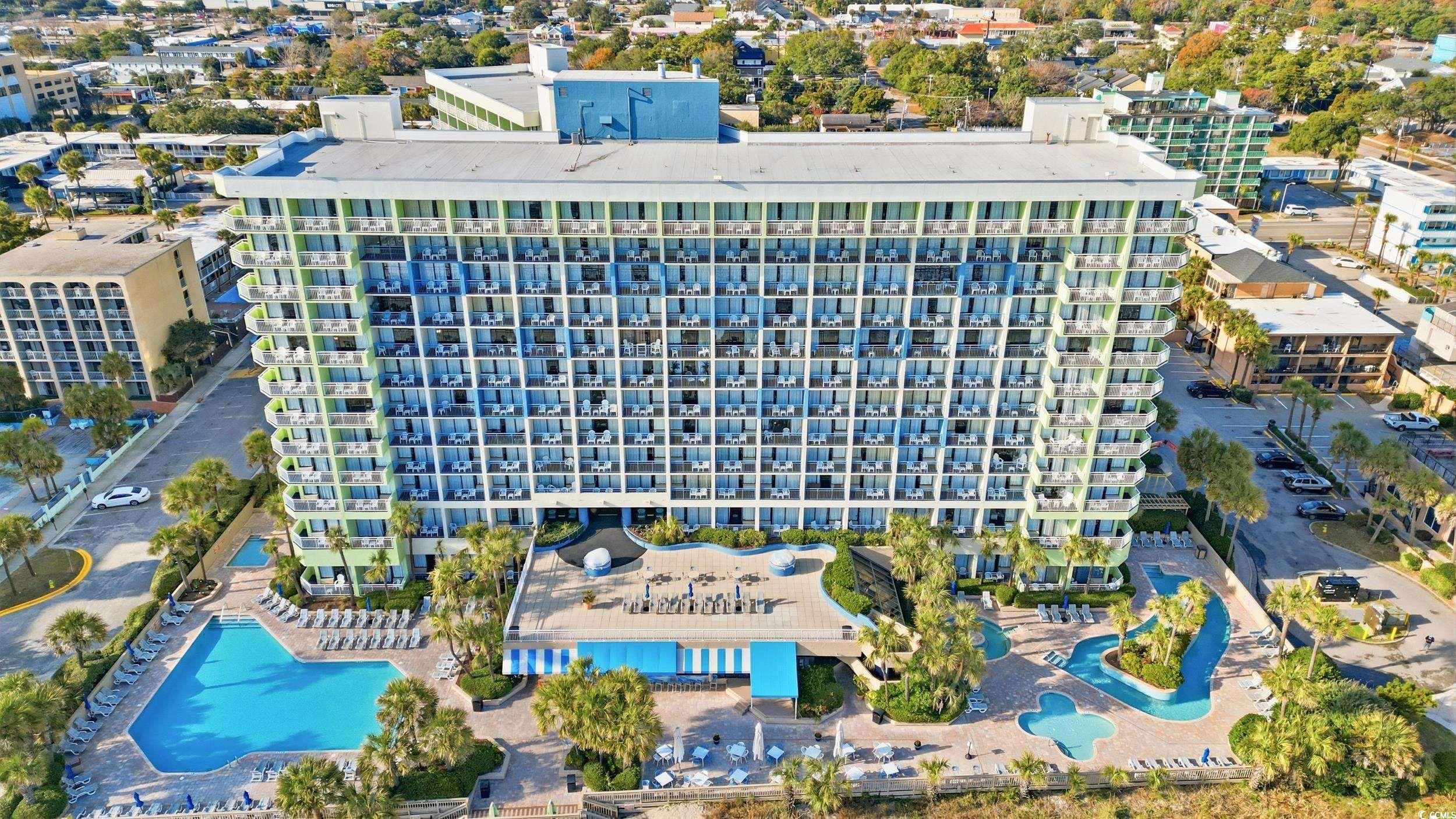 1105 South Ocean Boulevard, Unit 932 Myrtle Beach, SC 29577 - Photo 2 of 32 Drone / aerial view of a pool and apartment complex / building