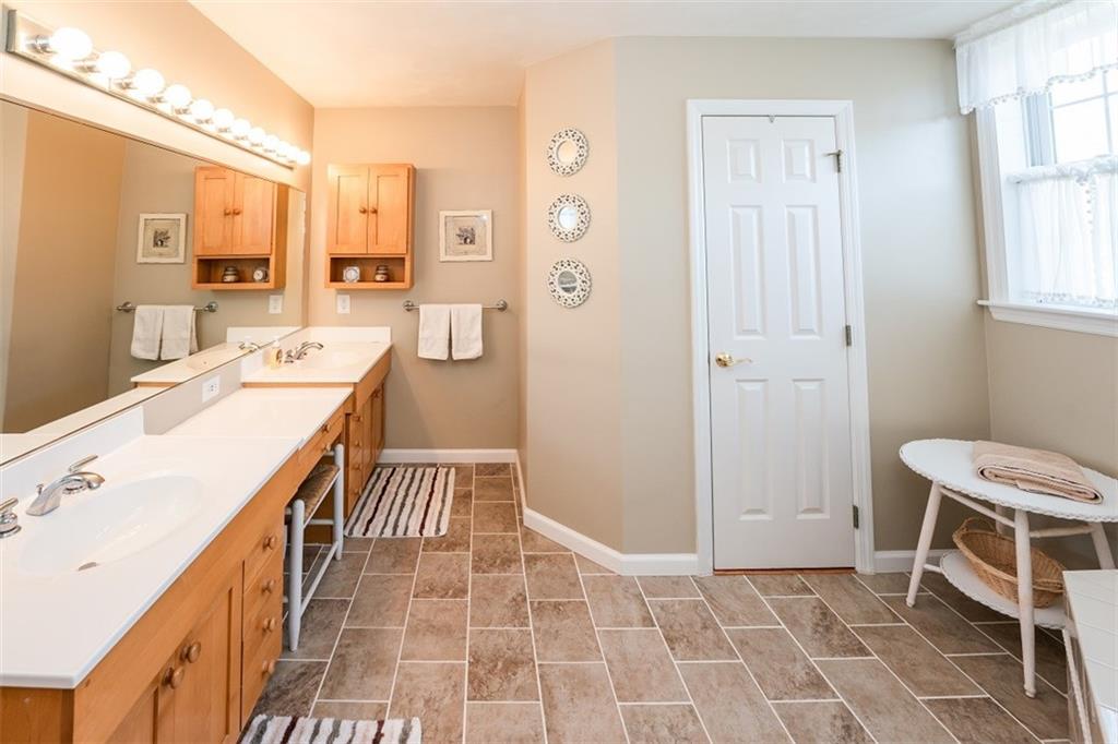 346 Forest Ridge Road Indiana, PA 15701 - Photo 19 of 25 a bathroom with a sink a vanity and a mirror