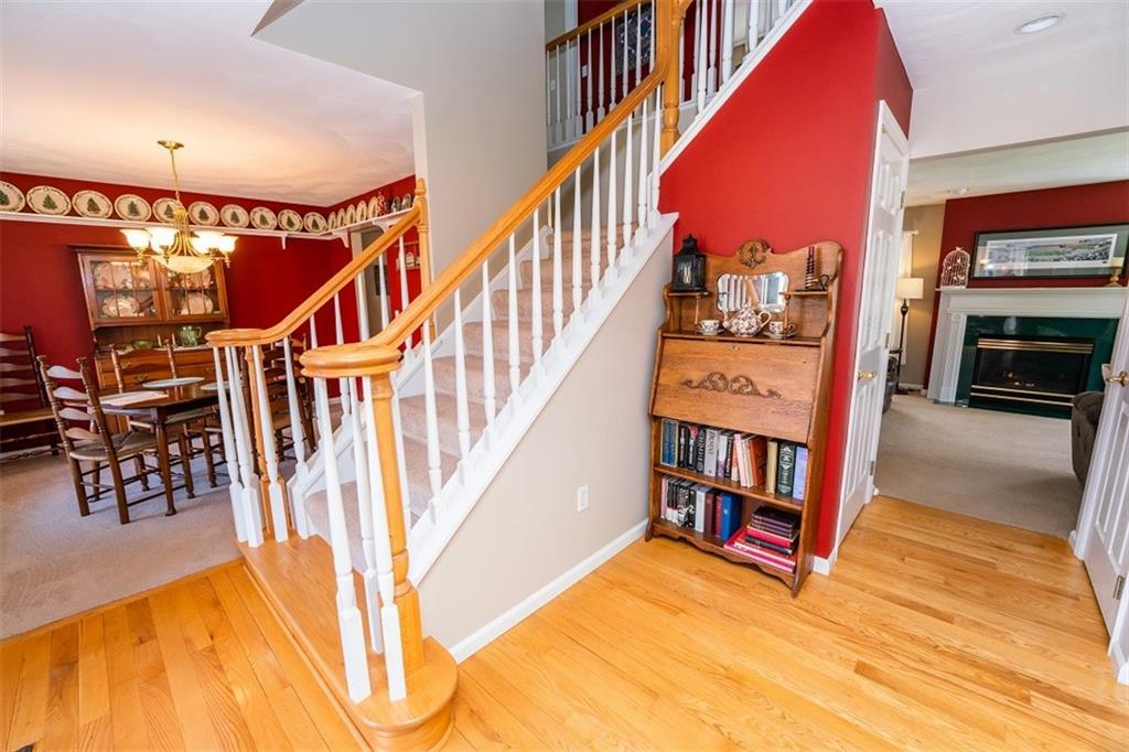 346 Forest Ridge Road Indiana, PA 15701 - Photo 3 of 25 a view of a hallway with wooden floor and stairs