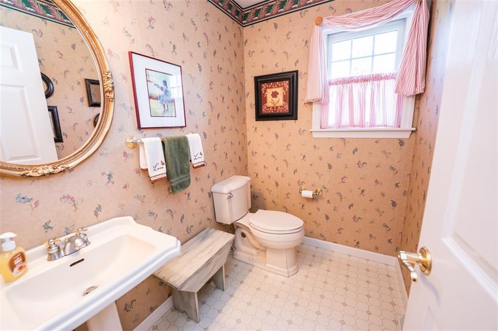 346 Forest Ridge Road Indiana, PA 15701 - Photo 6 of 25 a bathroom with a sink a toilet and a mirror