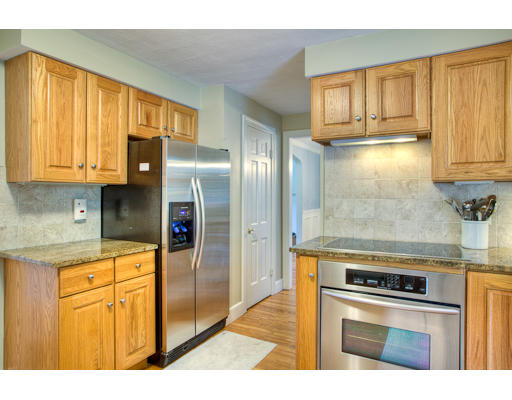 7 Lockeland Road Winchester, MA 01890 - Photo 2 of 19 a kitchen with stainless steel appliances granite countertop a stove a refrigerator and a cabinets