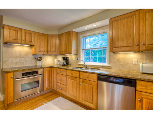 7 Lockeland Road Winchester, MA 01890 - Photo 3 of 19 a kitchen with a sink stove and cabinets