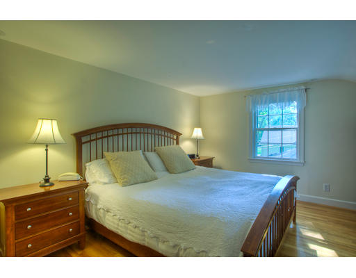 7 Lockeland Road Winchester, MA 01890 - Photo 9 of 19 a bedroom with a bed and a table