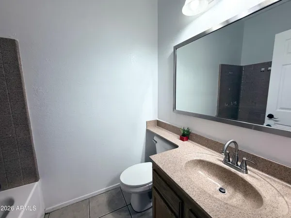 a bathroom with a sink and a toilet