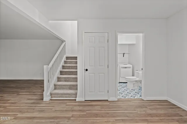 a view of entryway with wooden floor