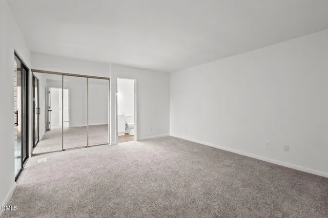 a view of a room with a large window