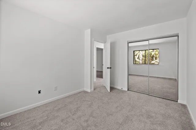 a view of a balcony with staircase