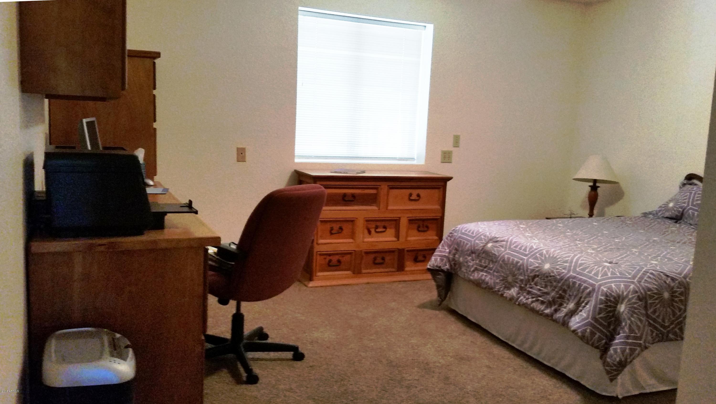 2110 North Sunset Road Apache Junction, AZ 85119 - Photo 17 of 35 bedroom and desk