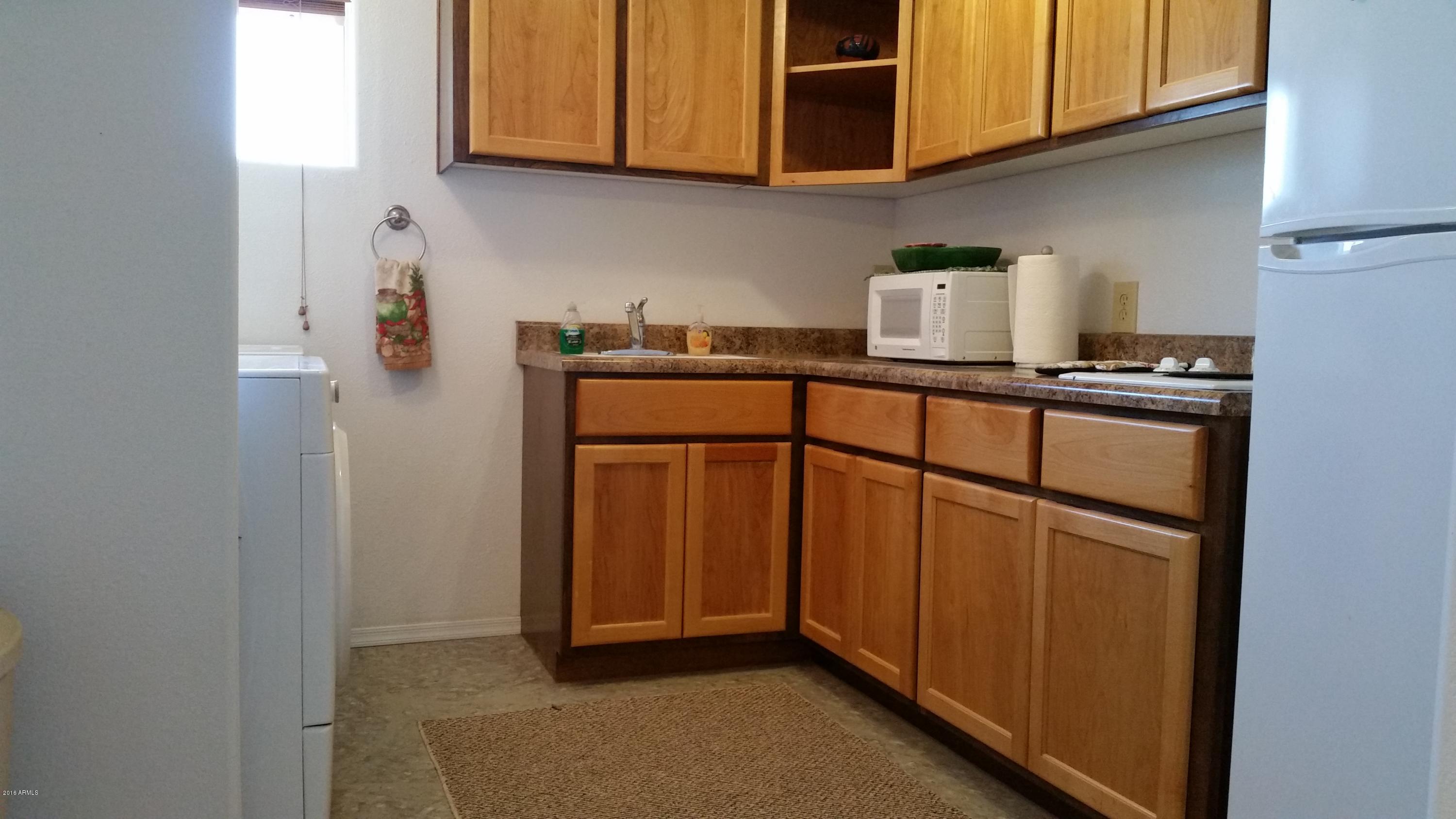 2110 North Sunset Road Apache Junction, AZ 85119 - Photo 22 of 35 kitchenette and laundry
