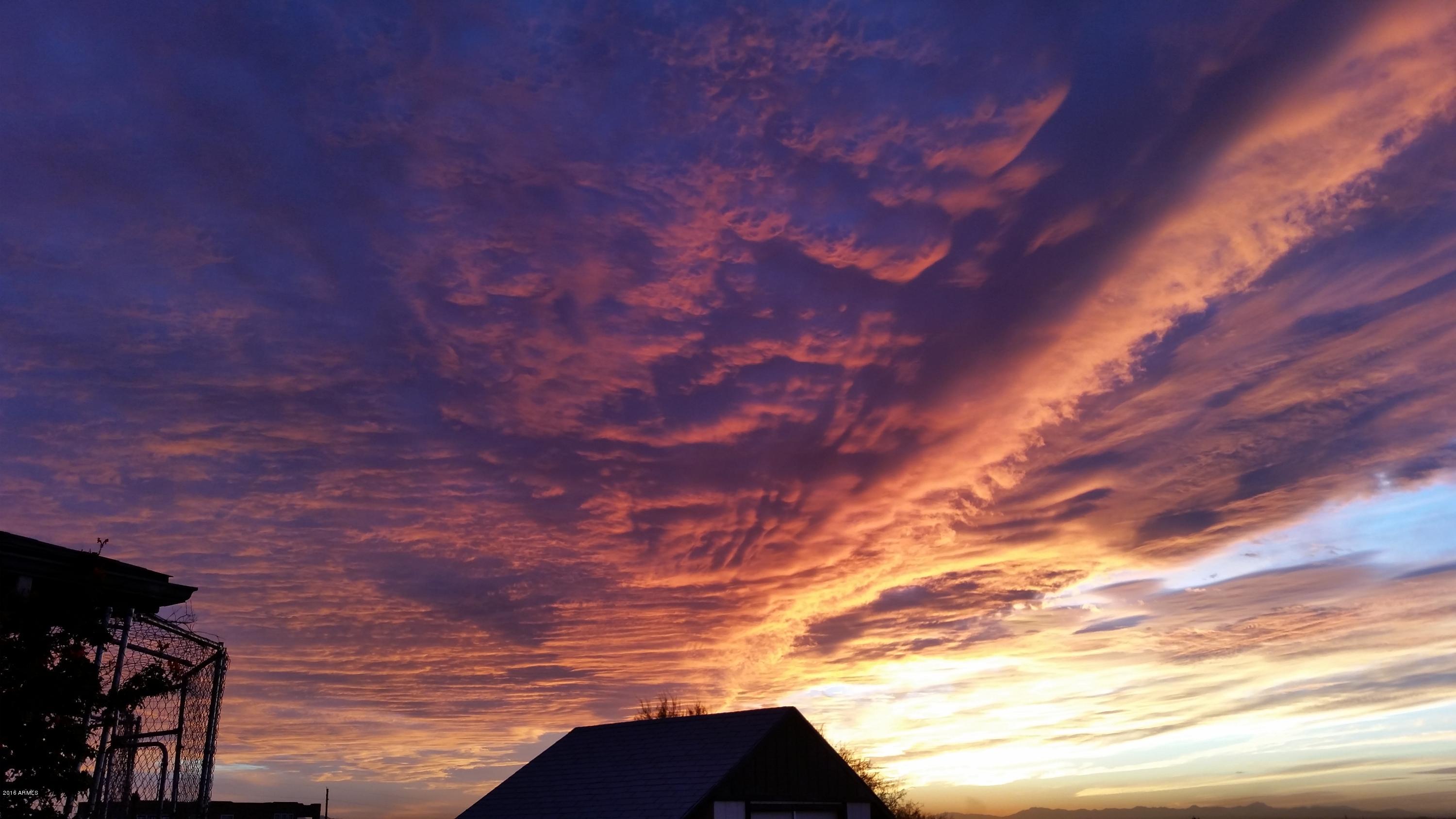 2110 North Sunset Road Apache Junction, AZ 85119 - Photo 33 of 35 sunset over shed