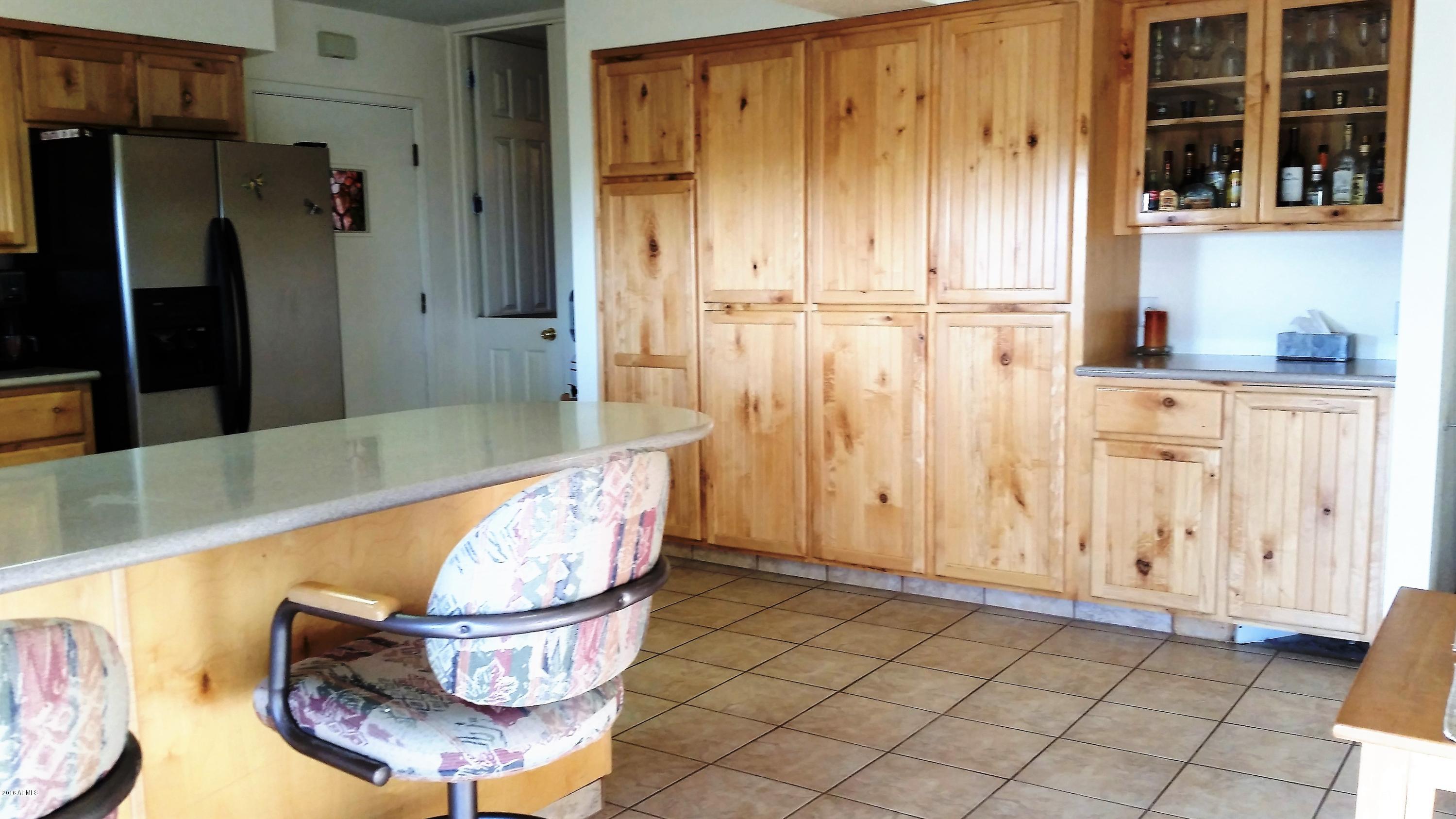 2110 North Sunset Road Apache Junction, AZ 85119 - Photo 7 of 35 kitchen pantry wall