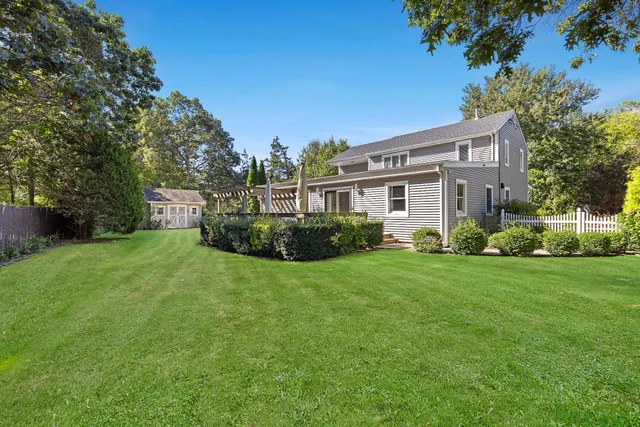 a house view with a garden space