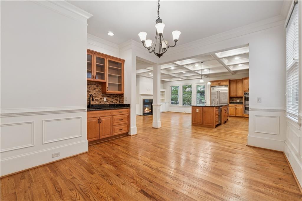 1220 State Street Northwest Atlanta, GA 30318 - Photo 14 of 40 a kitchen with a refrigerator and a stove top oven