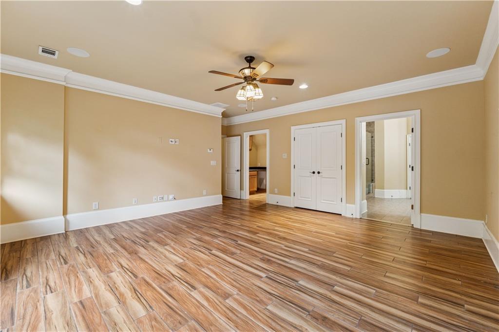 1220 State Street Northwest Atlanta, GA 30318 - Photo 26 of 40 a view of an empty room with wooden floor