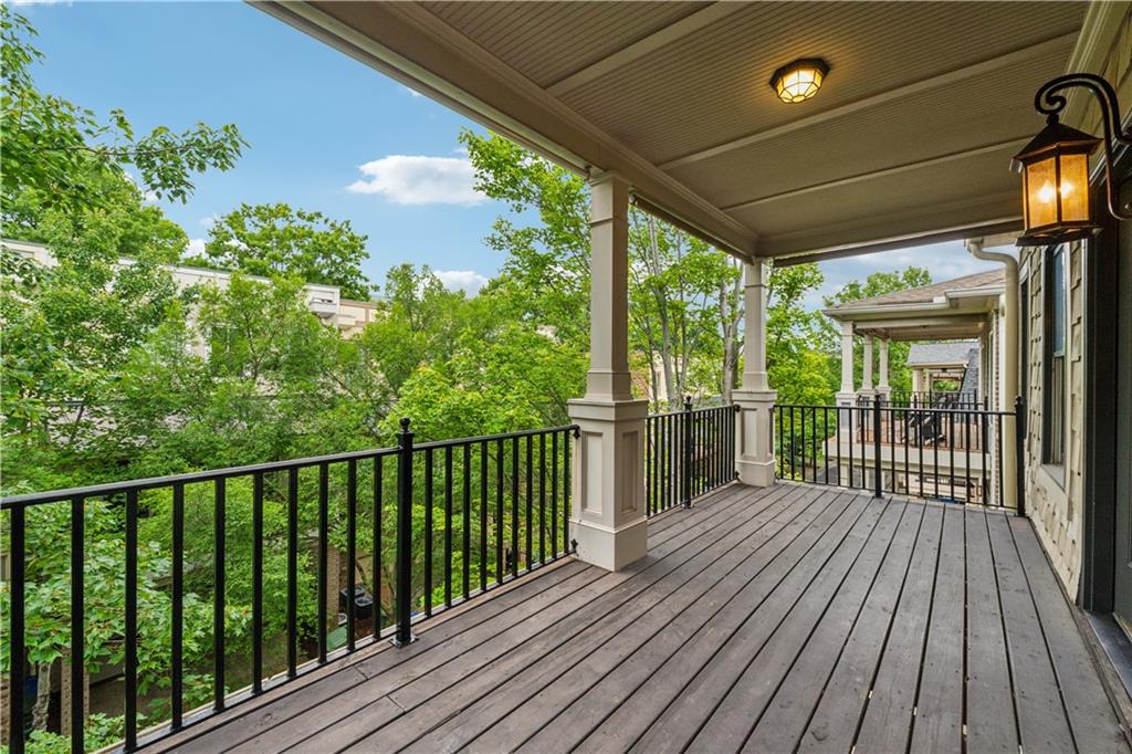 1220 State Street Northwest Atlanta, GA 30318 - Photo 33 of 40 a view of a balcony with wooden floor