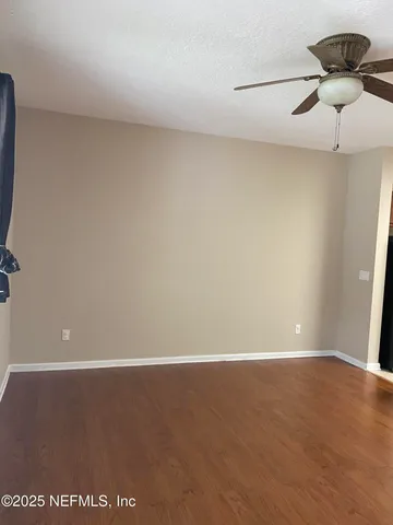 a kitchen with a stove a sink and a microwave