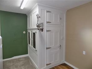 2031 Main Street Cardale, PA 15420 - Photo 5 of 10 a view of a hallway with wooden floor