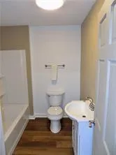 a bathroom with a sink and a toilet