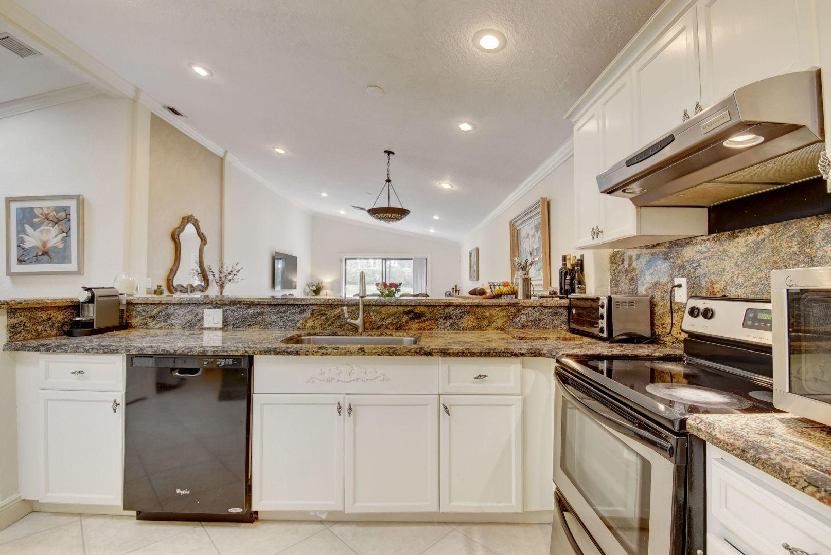 22710 Vistawood Way Boca Raton, FL 33428 - Photo 11 of 27 Granite Countertops & Backsplash