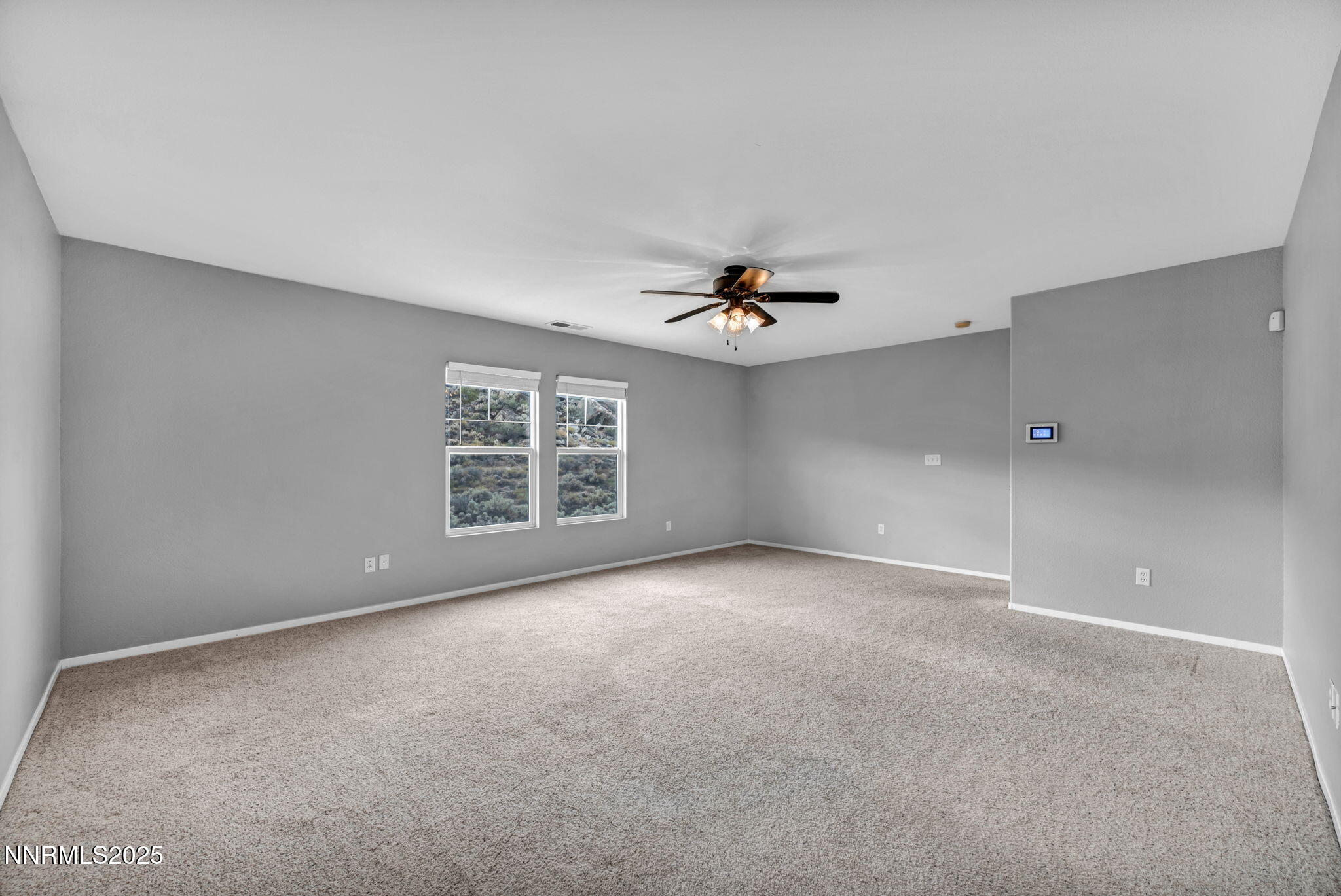 7644 Corso Street Reno, NV 89506 - Photo 16 of 54 a view of an empty room with a window