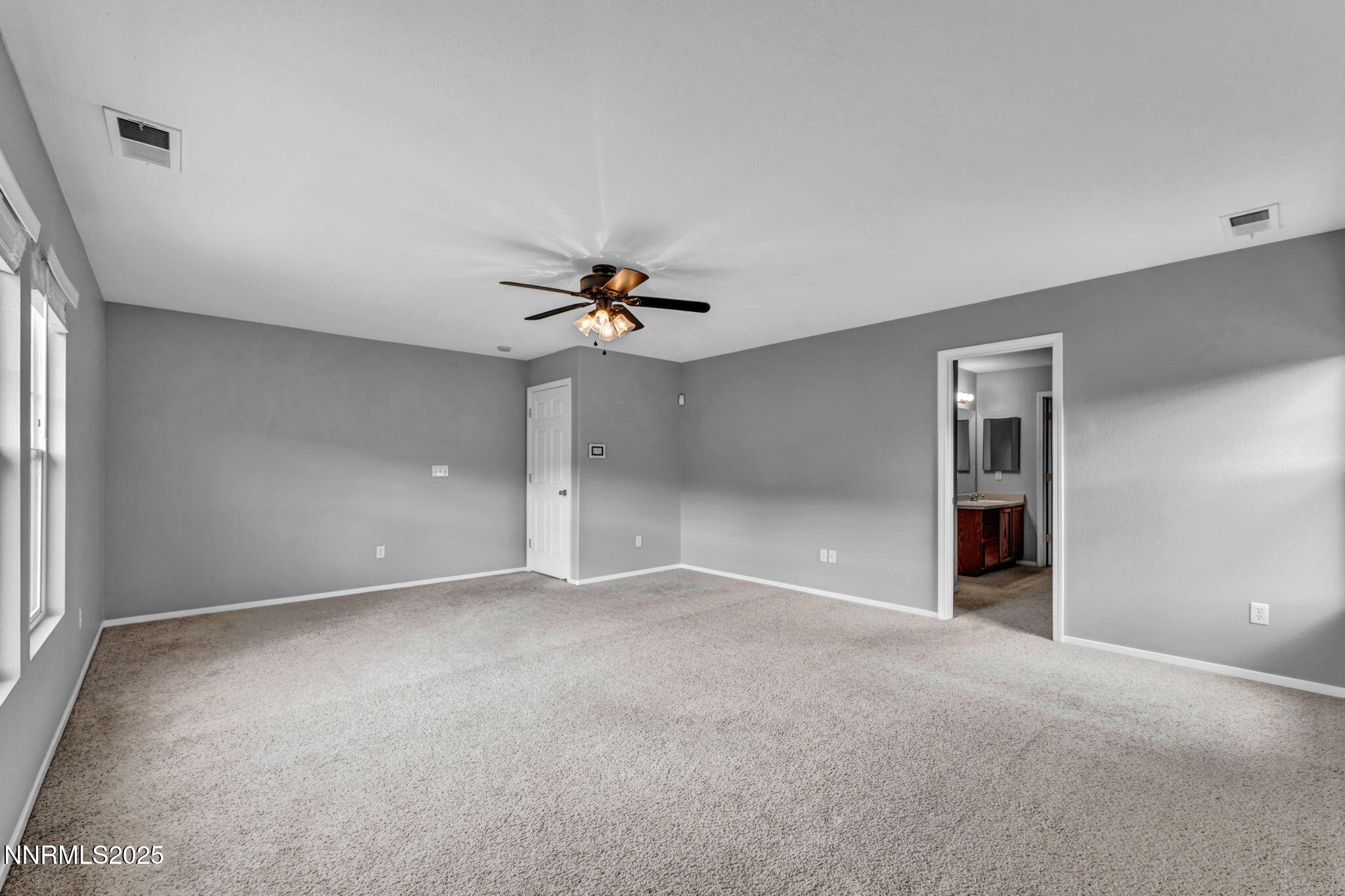 7644 Corso Street Reno, NV 89506 - Photo 17 of 54 a view of an empty room with a window