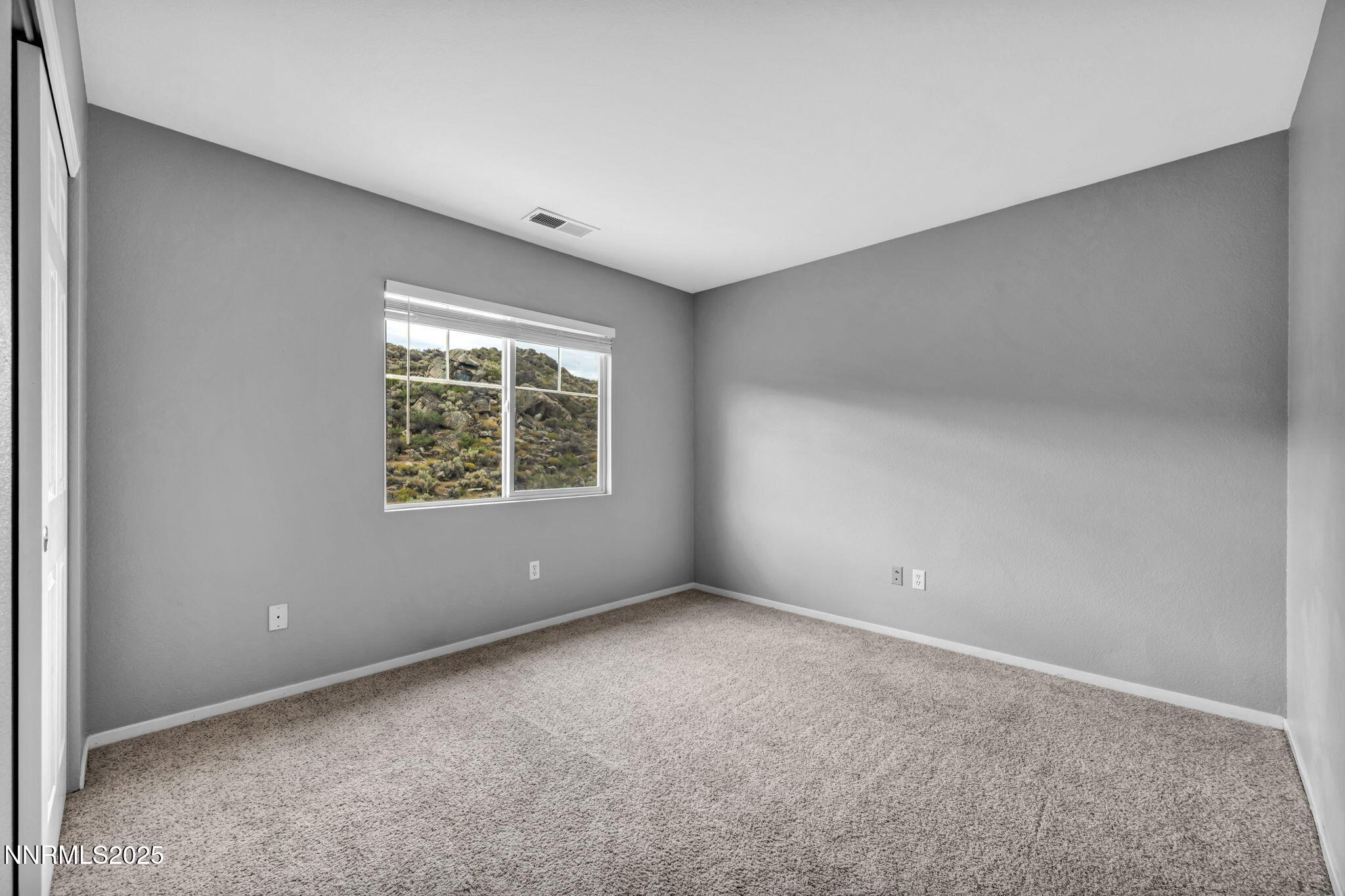 7644 Corso Street Reno, NV 89506 - Photo 21 of 54 an empty room with windows