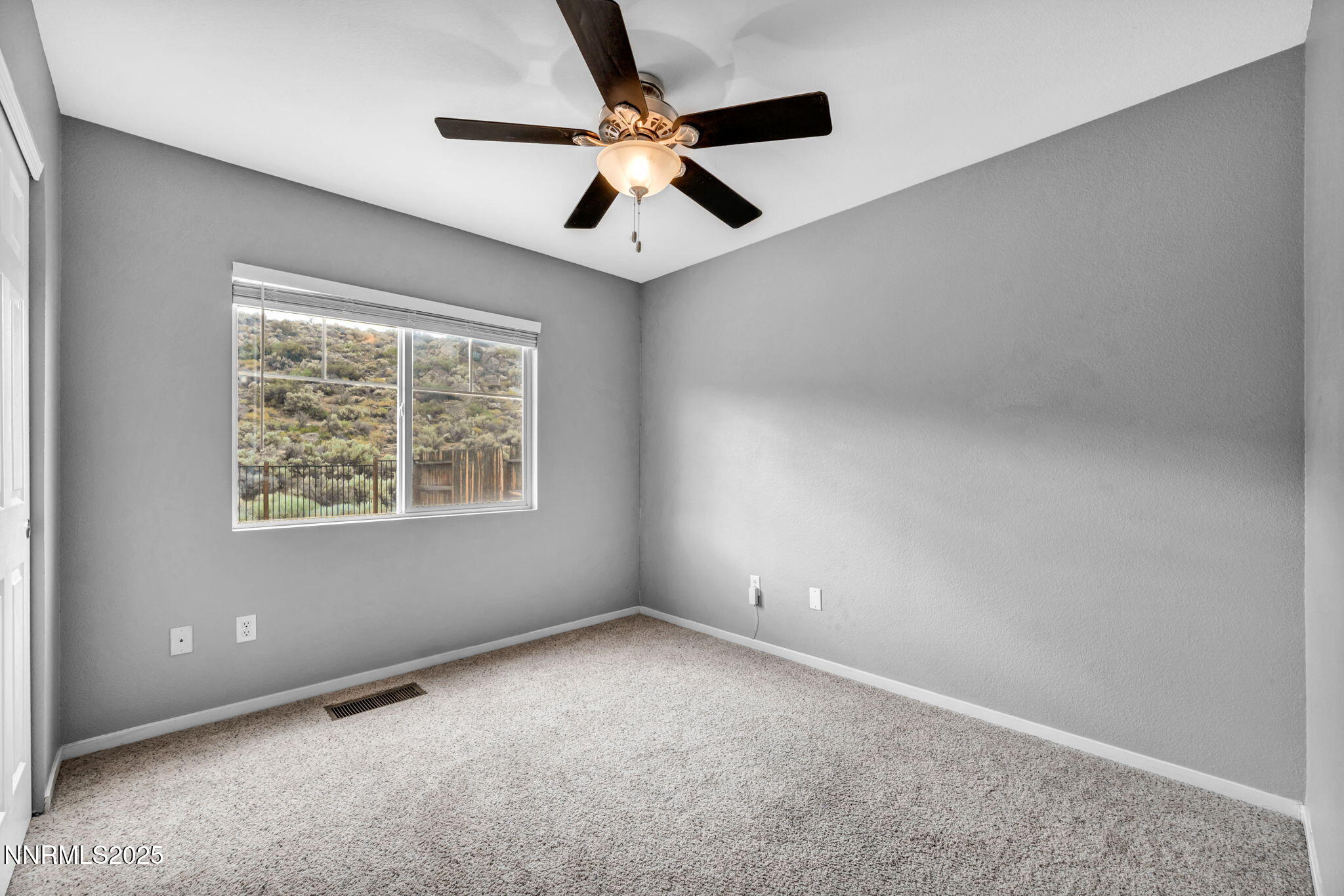 7644 Corso Street Reno, NV 89506 - Photo 44 of 54 an empty room with a window